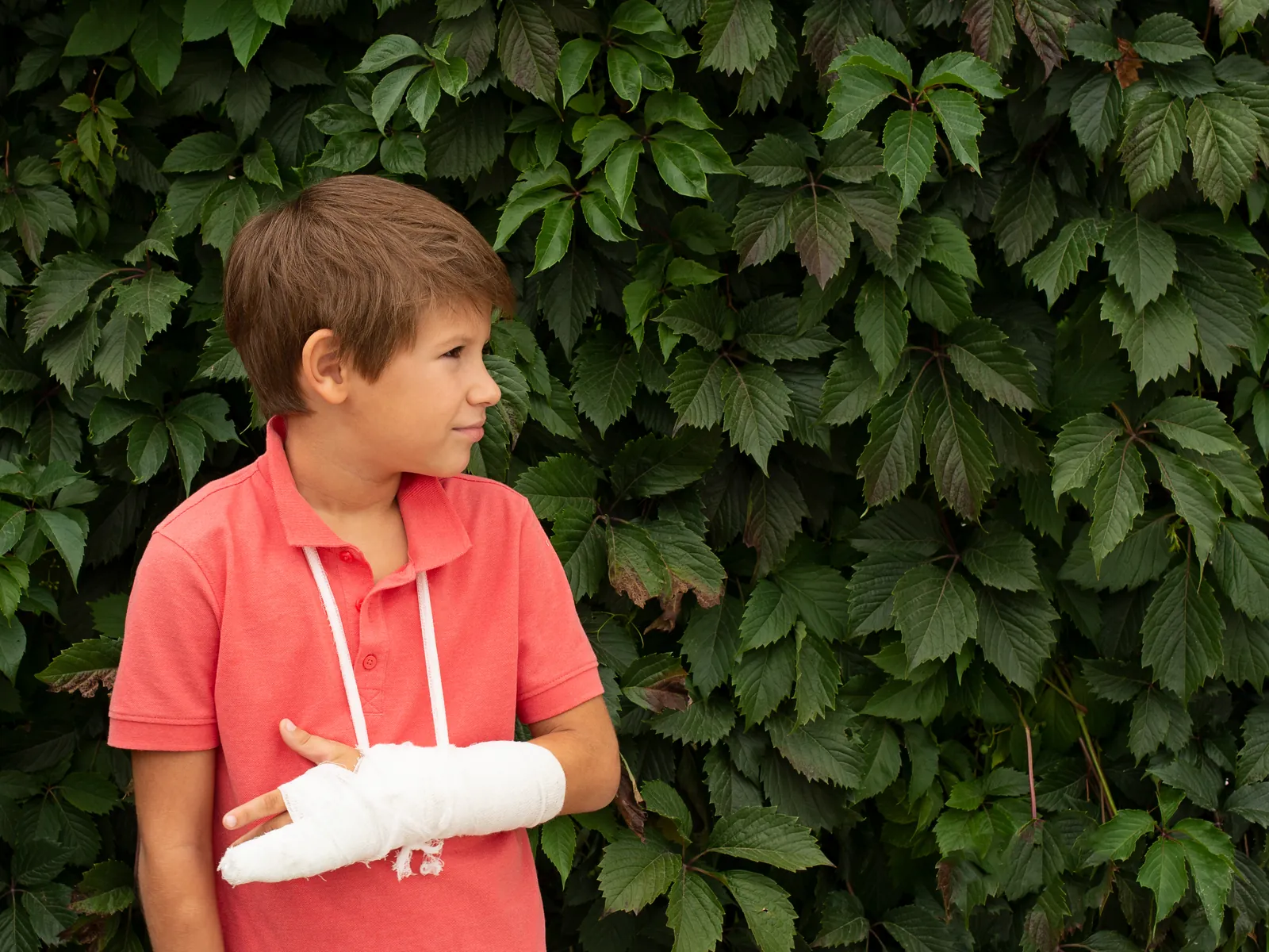 A boy with his arm in a cast