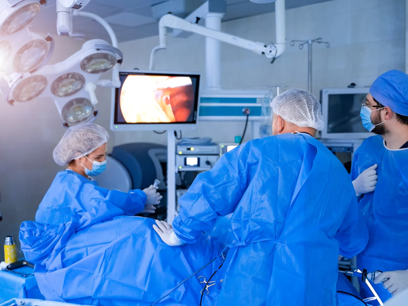 A surgical team at work in an operating theatre